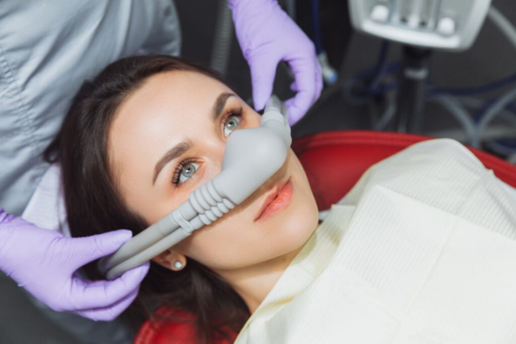 A woman getting nitrous oxide sedation at the dentist